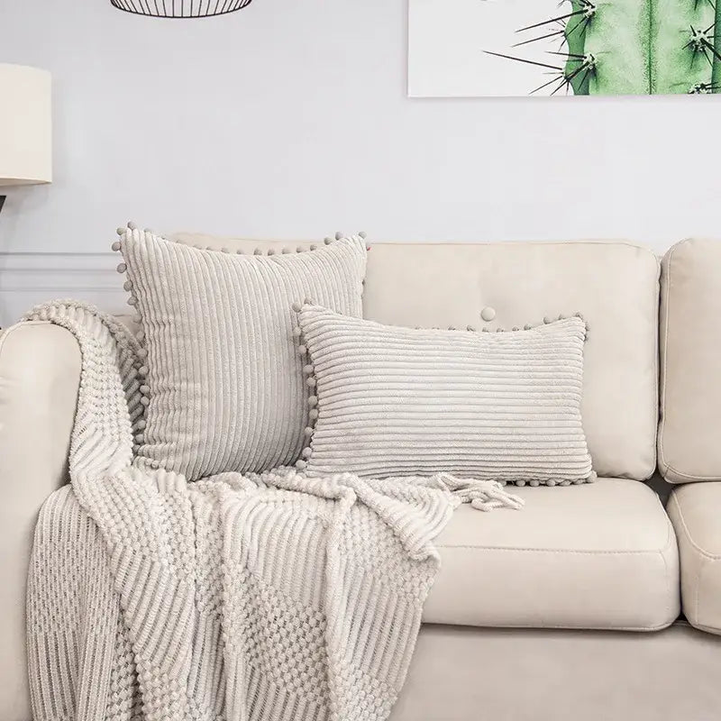 Beige striped corduroy cushion cover with pom pom trim made of soft fabric for living room decorbites beige striped lumbar