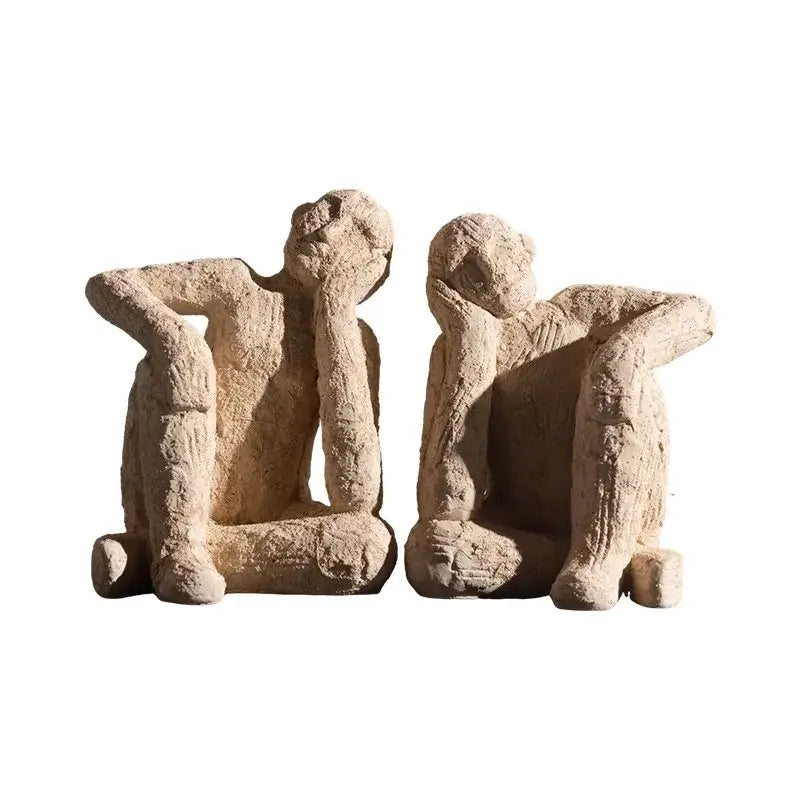 Beige textured abstract resin figurine sculpture featuring seated contemplative figures for living room decorbites decor