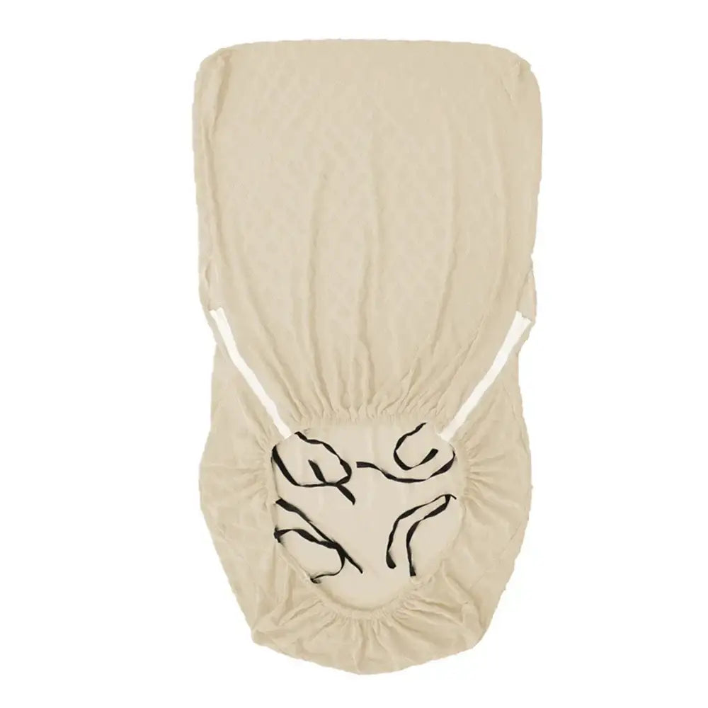 Beige textured jacquard elastic seat covers with black embroidered leaf pattern and white elastic straps for decorbites seat covers