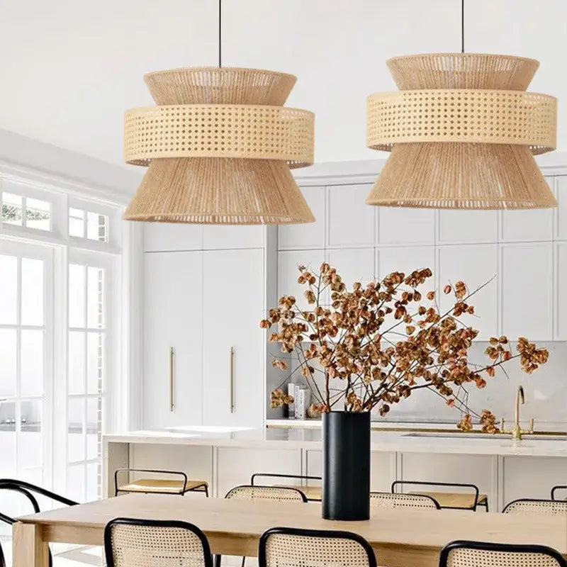 Two tiered beige pendant light made of handmade hemp rope by decorbites hanging in a dining room setting
