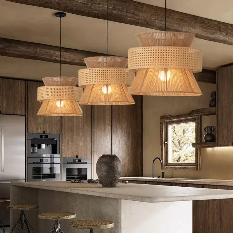 Beige tiered handmade hemp rope pendant light with woven rattan perforated shades hanging from black cords decorbites handmade hemp