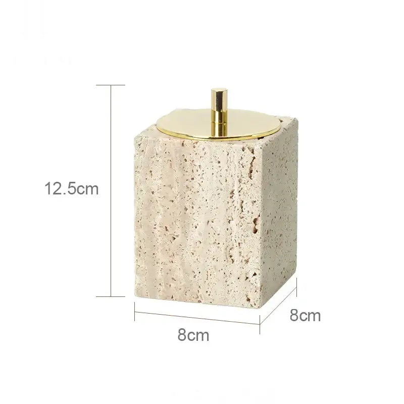 Beige travertine marble bathroom accessory cube with gold-toned circular lid and central knob from decorbites beige travertine set