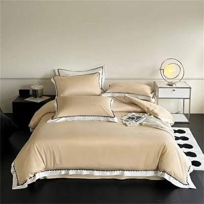 Beige satin bedding set with white scalloped trim and black piping from the decorbites hot diamond lace collection