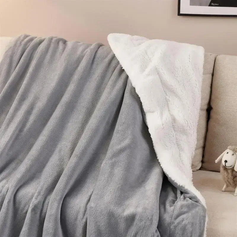 Beige and white sherpa twin blanket with gray and white plush fleece texture for cozy sherpa twin decorbites use