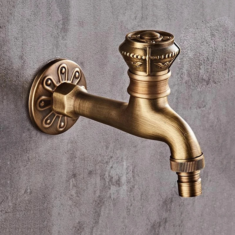 Antique brass wall mounted bibcock with ornate floral patterns for garden outdoor and modern kitchen bathroom use