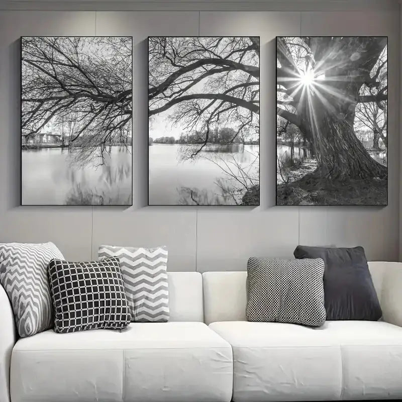 Three-panel black-and-white framed DecorBites™ canvas posters of a tree lake sunset with sunburst effect