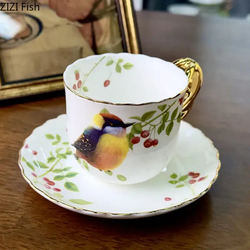 White porcelain bird pattern ceramic mug and saucer set with gold trimmed edges by decorbites for dining room decor