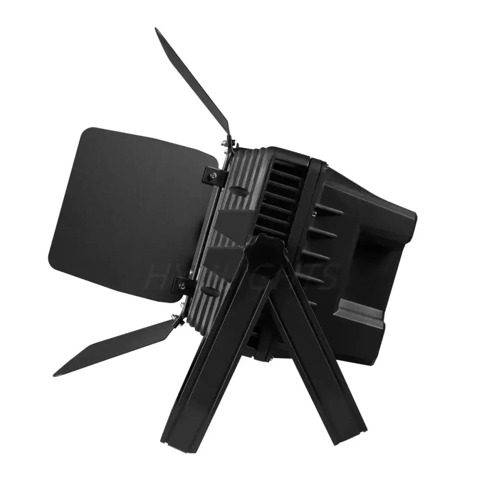 Black 24x18w rgbwa uv led wall wash with adjustable barn doors mounted on a tripod stand for living room use