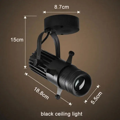 Black adjustable aperture led spotlight with cylindrical body and adjustable arm for commercial decorbites adjustable aperture lighting