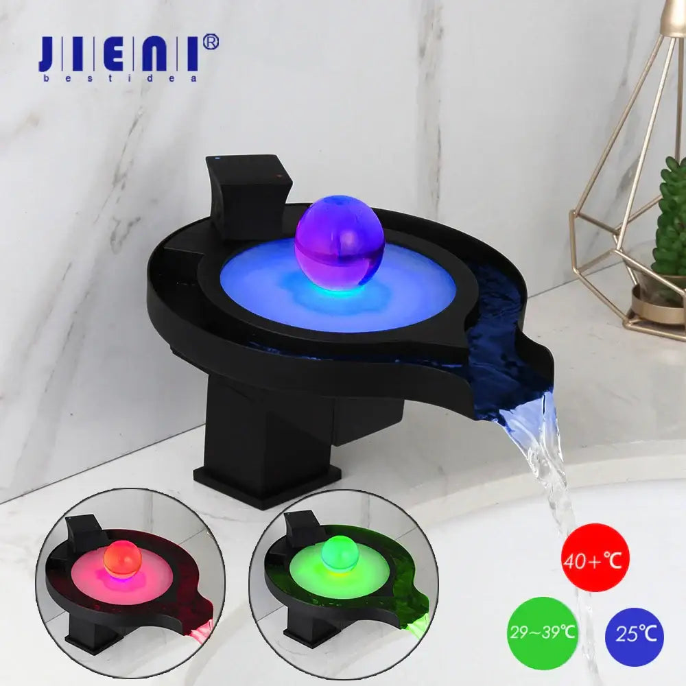 Black and chrome brass led waterfall basin faucet with glowing purple sphere centerpiece and adjustable temperature settings