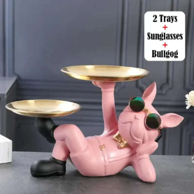 Decorbites bulldog animal figurine in pink wearing sunglasses and suit holding gold trays as living room butler tray
