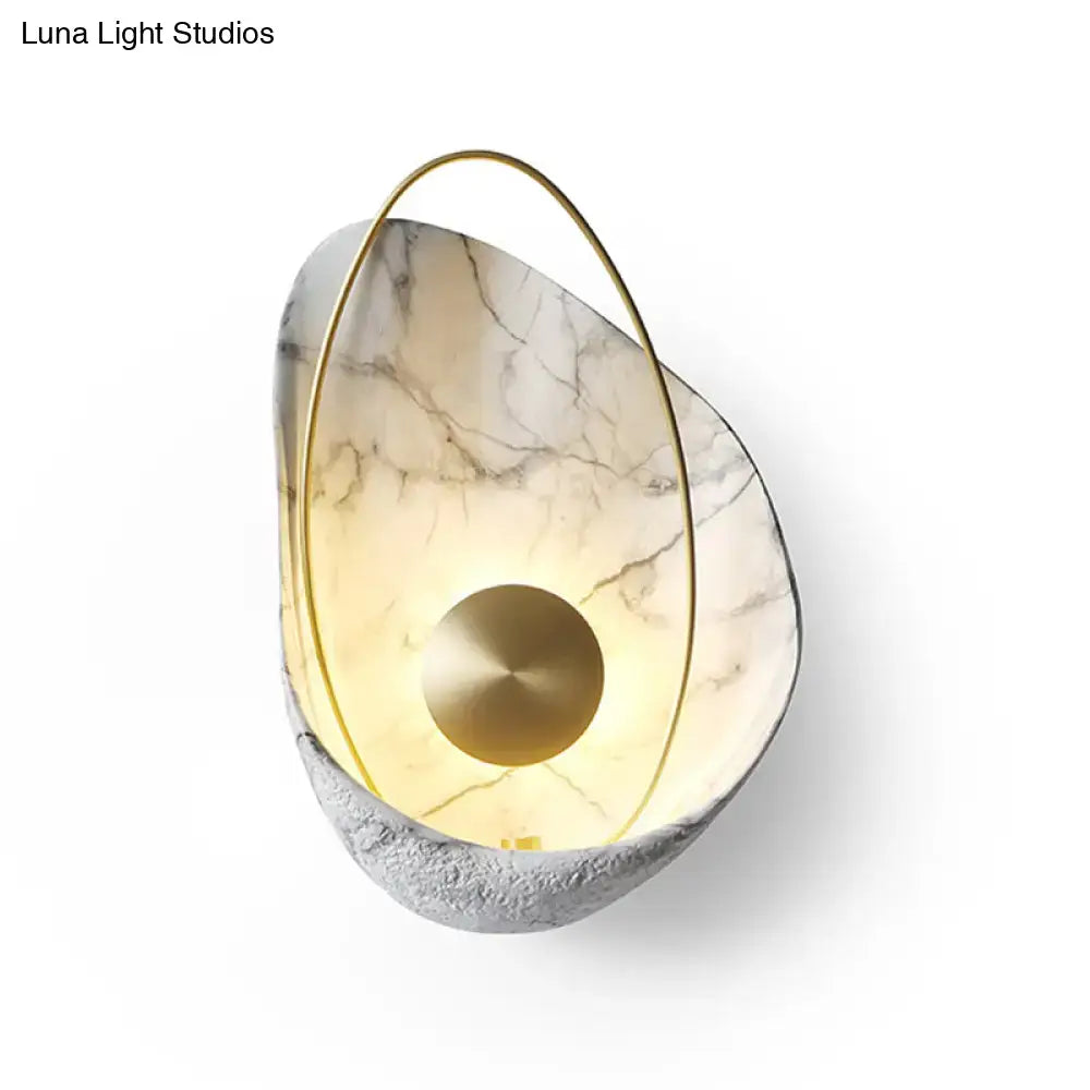 Modern wall light with white marble shell and gold metal frame supporting maximum bulb wattage 40w for living room use