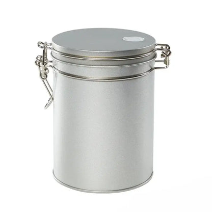 Silver metallic cylindrical hermetic food storage pot with hinged lid and chain clasp by decorbites