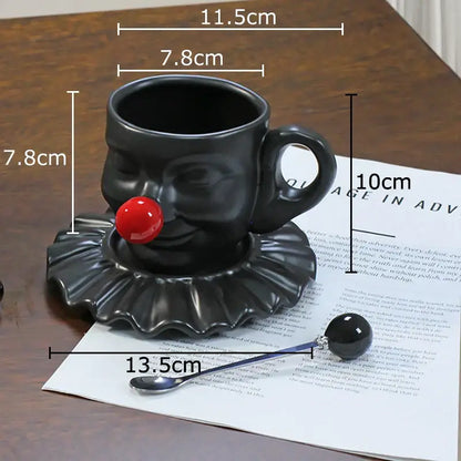 Black ceramic joker head cup with red nose and ruffled collar on silver saucer porcelain coffee set decorbites joker head