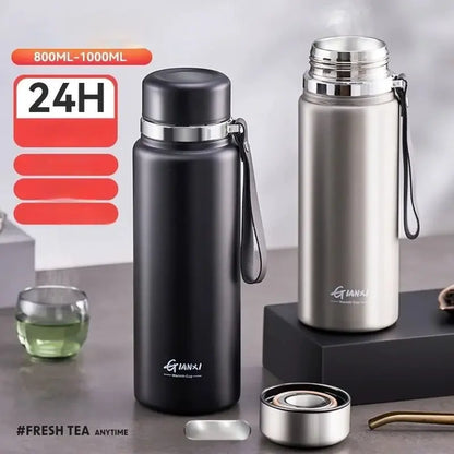 Black and silver stainless steel insulated 24hr cold cup with carrying strap for kitchen and travel use