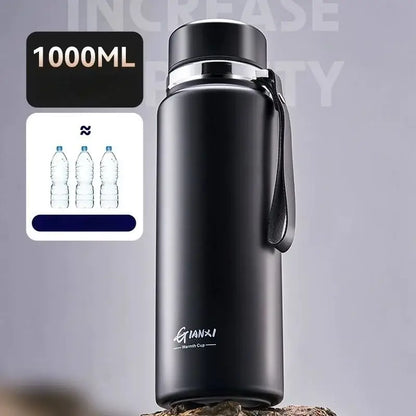 Black and silver stainless steel 24hr cold cup insulated water bottle with matte finish silver rim lid and carrying strap