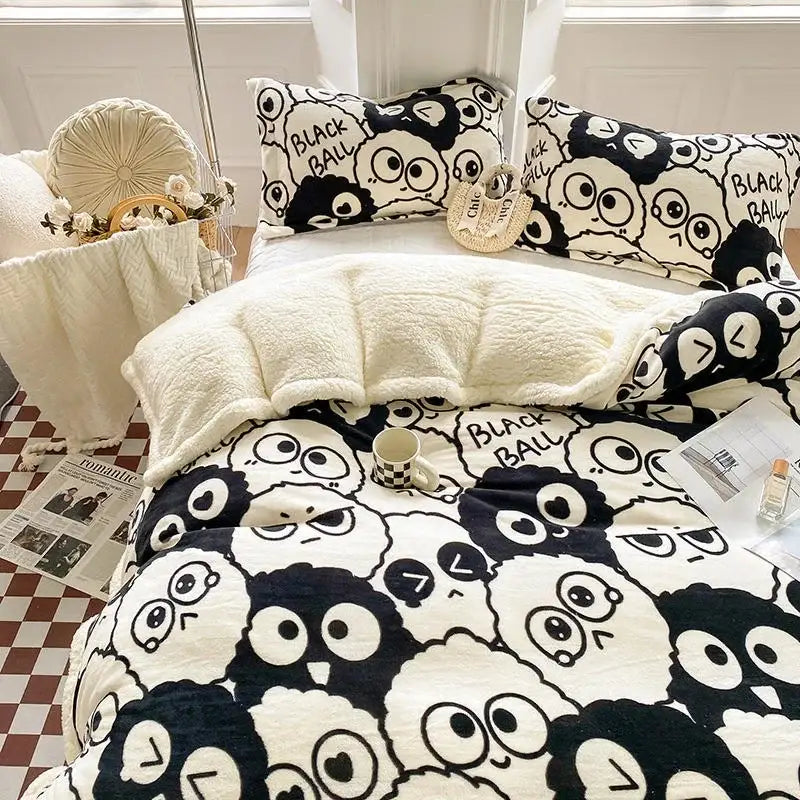 Black and white cartoon print cozy blanket duvet set featuring a playful sheep design with oversized eyes by decorbites