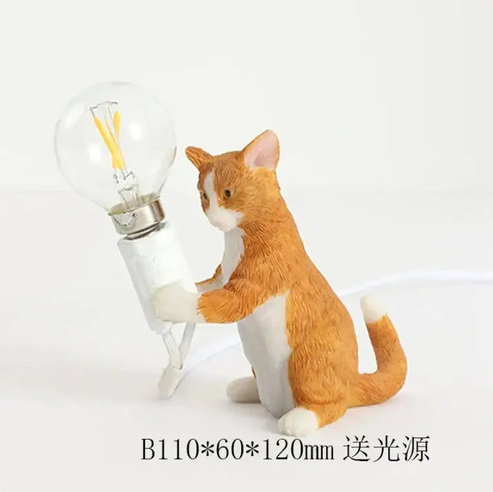 A charming orange and white cat resin table lamp with a clear glass bulb by decorbites cat resin for bedroom decor