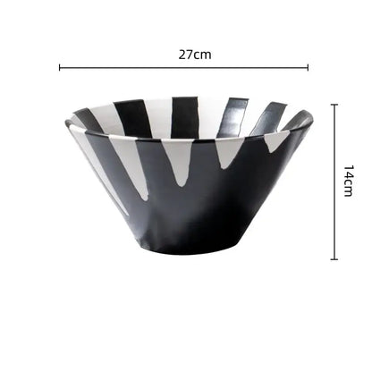 A sleek black and white check geometric ceramic bowl with modern tapered design for living room decor