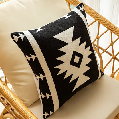 Black and white geometric embroidered cushion cover with bold tribal-inspired design for living room decorbites decor