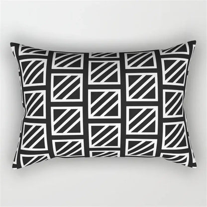 Black and white rectangular pillow with geometric wave line pattern of intersecting squares for bedroom decor