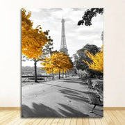 A framed DecorBites™ black and white nordic landscape canvas set featuring the Eiffel Tower and yellow autumn trees