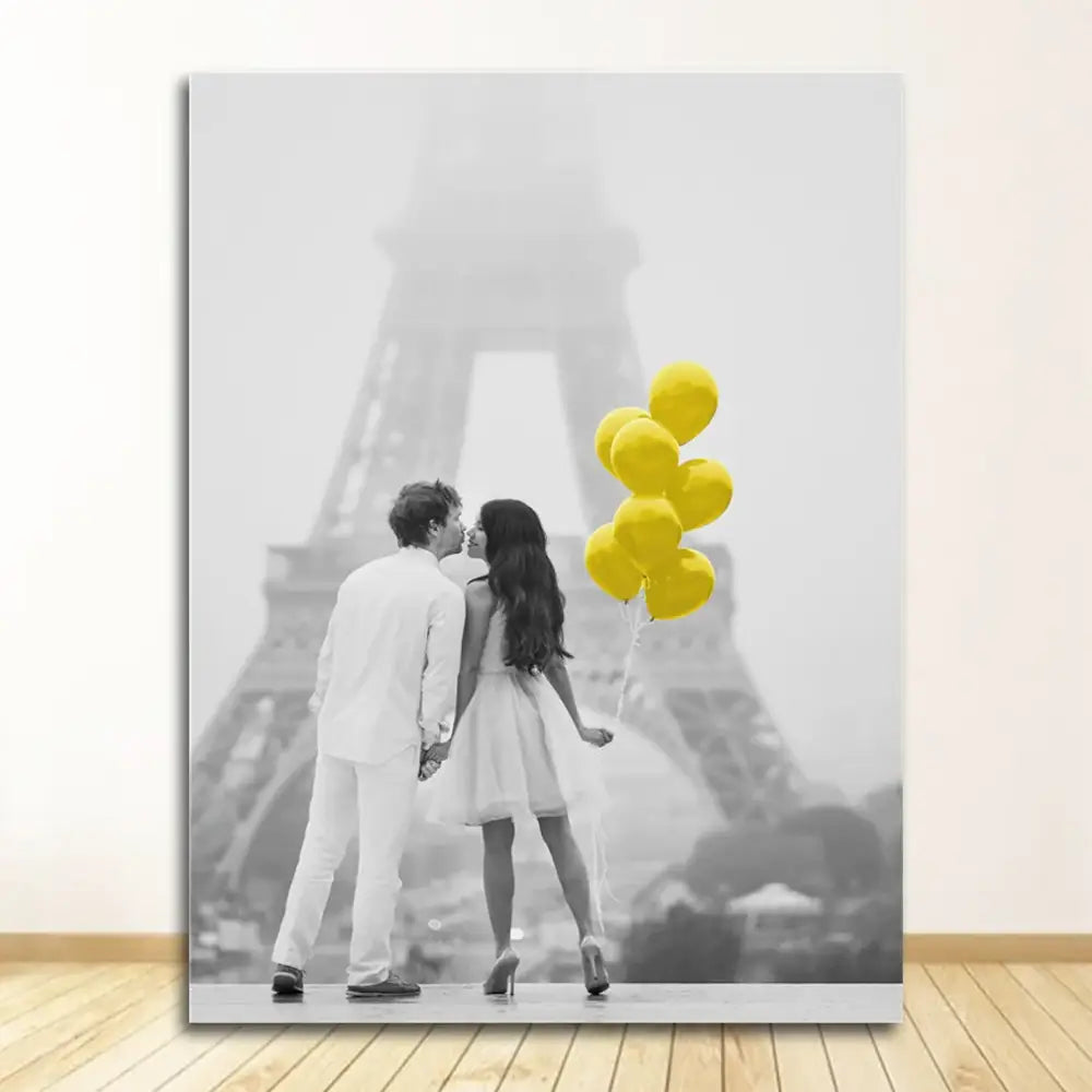 Decorbites black and white nordic landscape canvas set featuring a couple kissing with yellow balloons by eiffel tower