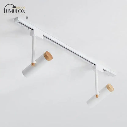 Modern white DecorBites™ Nordic tubular metallic spotlight with wooden cap featuring sleek metal track lighting components