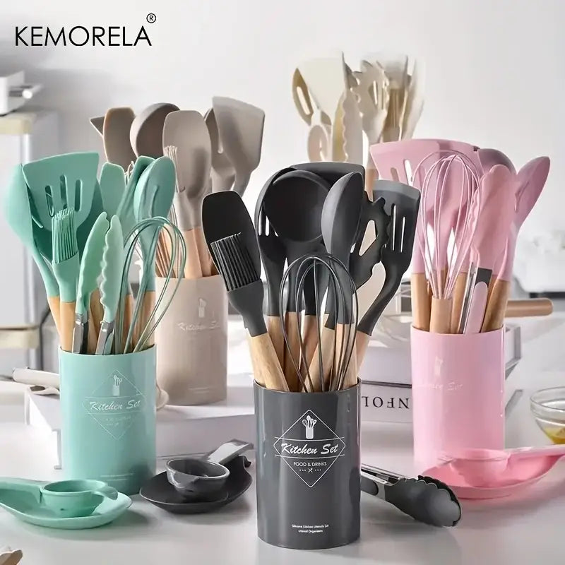 Black and wood silicone kitchen utensil set with wooden handles in gray storage box for kitchen organization