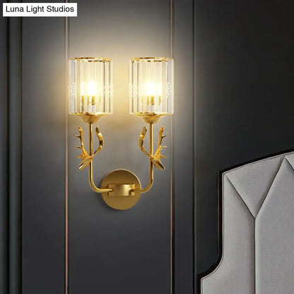 Gold-toned black antler crystal wall sconce with two e26 e27 lights and antler-inspired arms for bedroom lighting