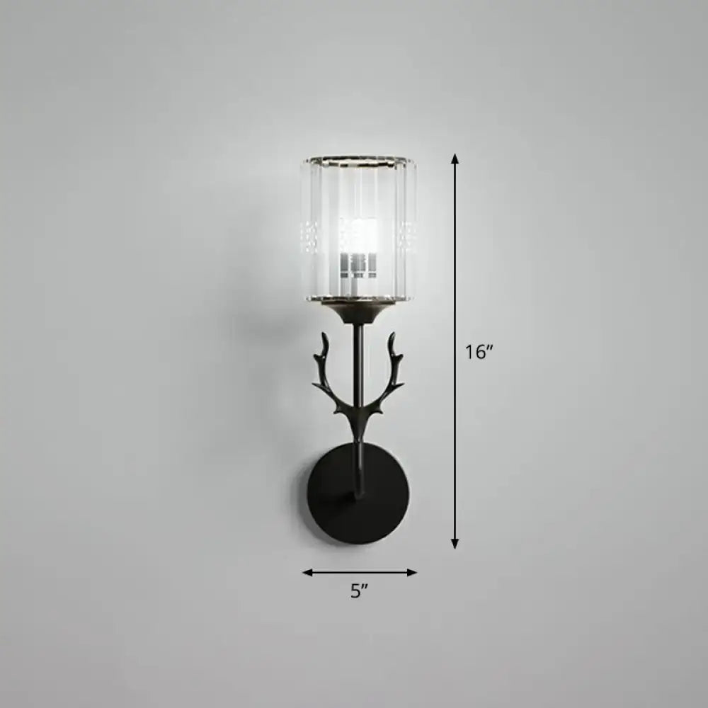 Black metal antler-inspired wall sconce with clear cylindrical glass shade compatible with e26 e27 bulbs for bedroom use
