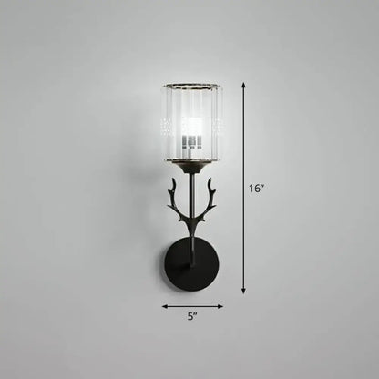 Black metal antler-inspired wall sconce with clear cylindrical glass shade compatible with e26 e27 bulbs for bedroom use