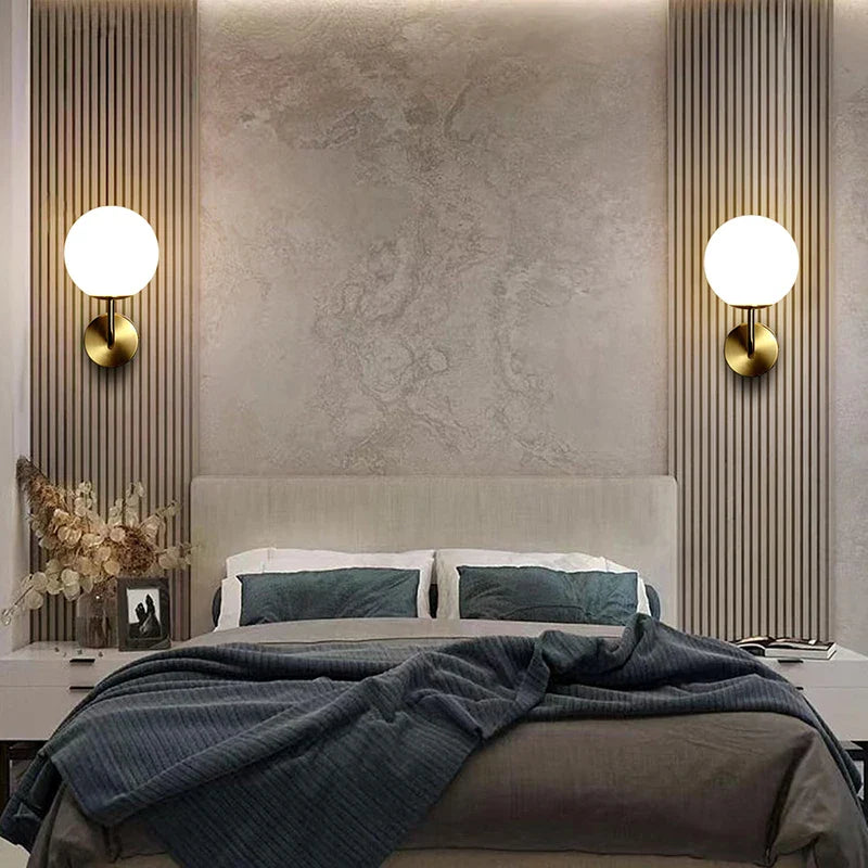 Bedroom with wall sconces.