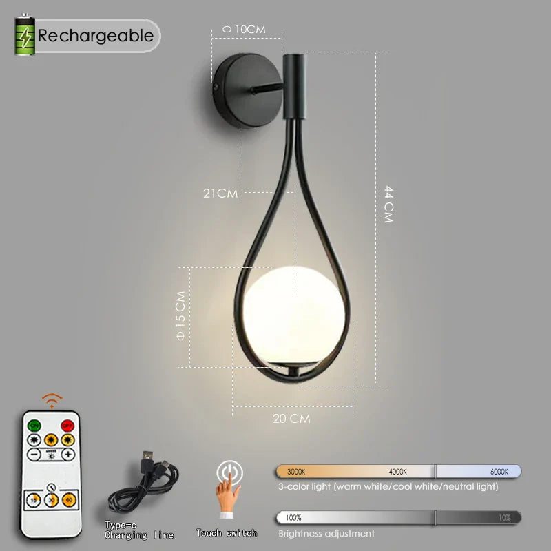 Black teardrop wall sconce with remote control and adjustable color temperature.