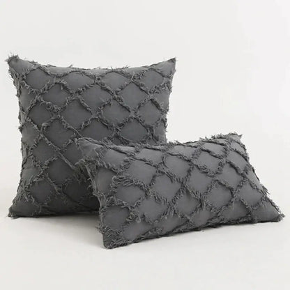 Dark gray black boho lumbar pillow cover with textured diamond pattern and frayed edges for decorbites black boho decor