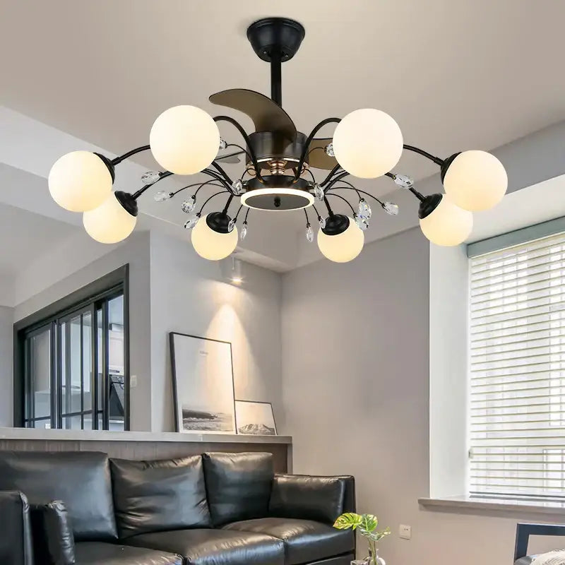 Black metal branch ceiling fan with eight frosted globe fan lights and crystal accents for bedroom use