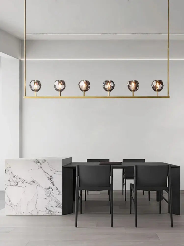 Gold-toned linear pendant chandelier lights with six faceted glass globes black bronze copper decorbites for kitchen island