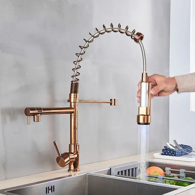 Rose gold kitchen faucet with a flexible coiled spring neck and pull-out spray head for decorbites black bronze dual spout