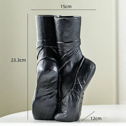 Black ceramic ballet shoes vase shaped like pointe shoes ideal for bedroom decor and elegant display