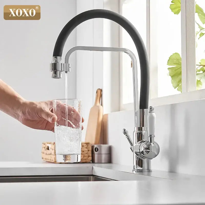 Black & chrome kitchen faucet with white ceramic handle and black flexible spout by xoxo for decorbites black deck use