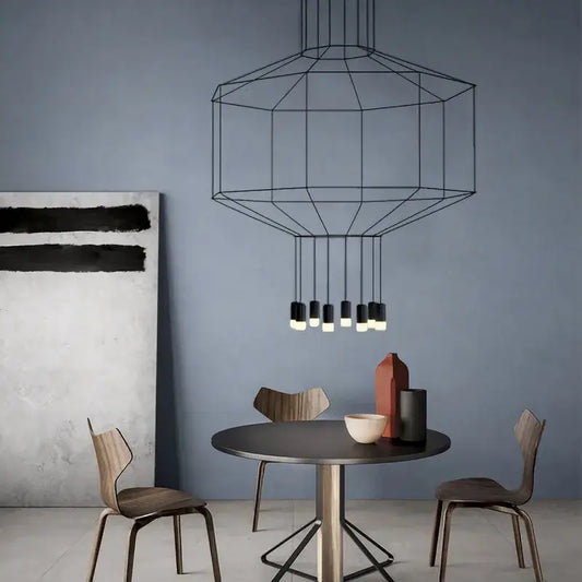 Black geometric wireframe ceiling chandelier with multiple hanging cylindrical lights decorbites designer nordic ceiling