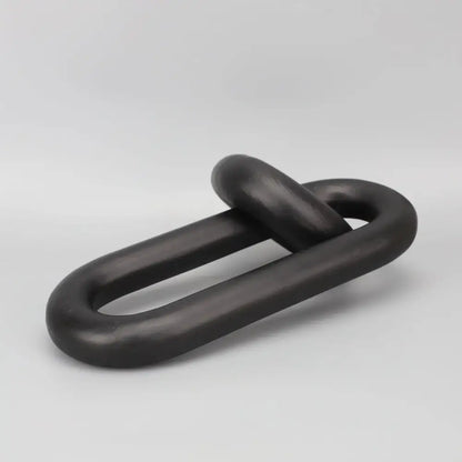 Black geometric resin chain link sculpture with matte black finish decorbites geometric resin ornament for living room decor