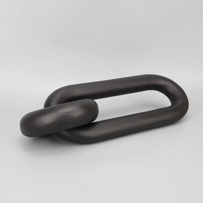 Black geometric resin ornament chain link sculpture in black matte finish for living room decor by decorbites