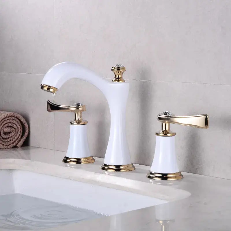 White ceramic bathroom sink faucet with gold brass accents and crystal knobs for luxury brass bathroom sink faucets