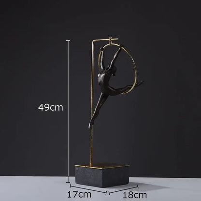 Bronze gymnastic acrobat resin sculpture suspended in golden hoop on elegant gold stand for living room decorbites decor