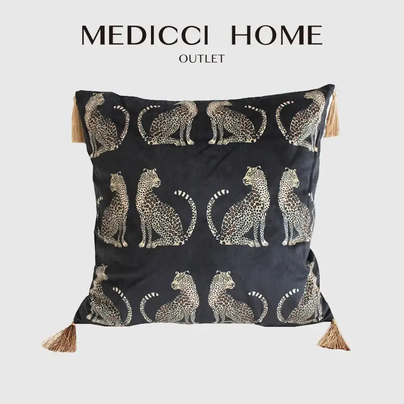 Black velvet throw pillow cover with gold leopard print and tassels at each corner for living room decor