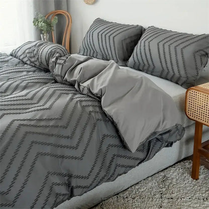 Gray chevron-patterned quilt set with textured stitch design from black and gray zigzag stripe flower cut duvet cover