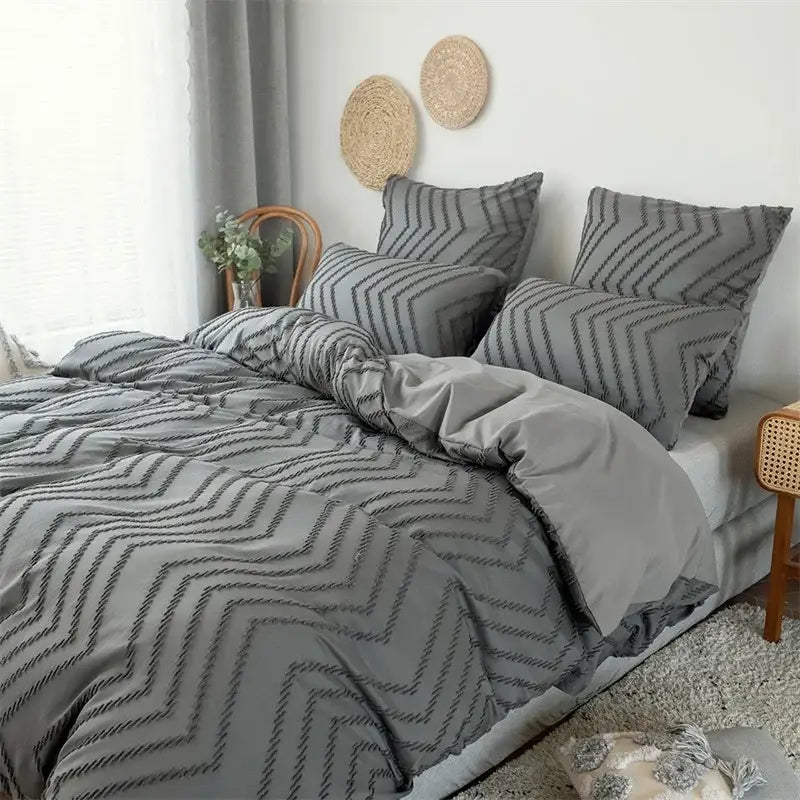 Gray chevron-patterned duvet cover with textured stitched design in black and gray colorful stripe flower cut set