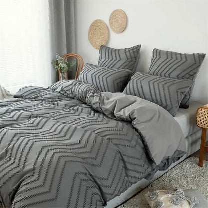 Gray chevron-patterned duvet cover with textured stitched design in black and gray colorful stripe flower cut set