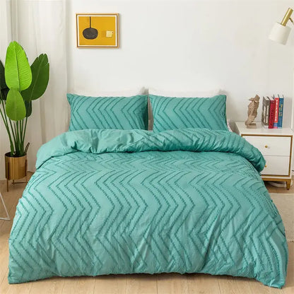 Teal textured fabric quilt set with zigzag pattern complementing black and gray stripe flower cut duvet cover